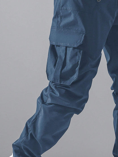 Manfinity Ezcore Loose Fit Men'S Cargo Pants with Flap Pockets, Side Drawstring and Elastic Waist, for Fall